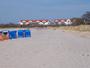 Rügen - Strand von Glowe mit Hotelanlage im Hintergrund